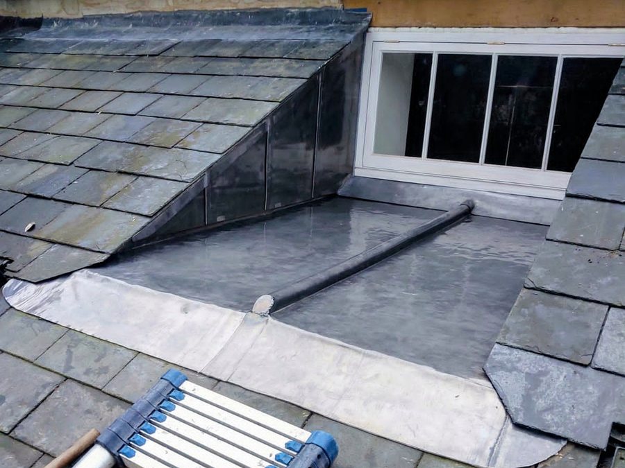 Craig Haskins of CMH Leadwork & Roofing Services working on a roof in Dorset